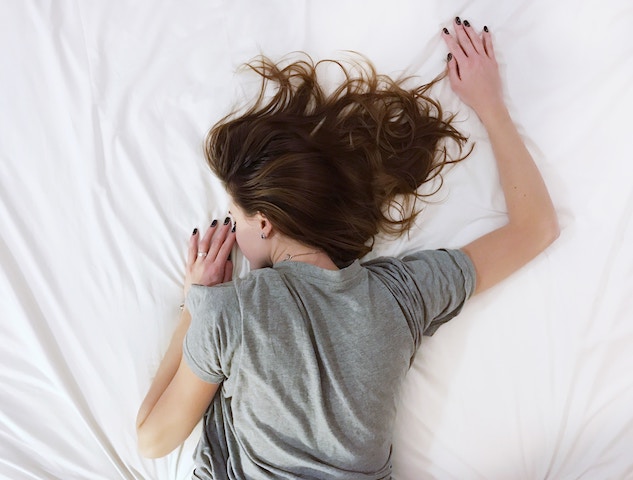 Woman Sleeping for fitness recovery.