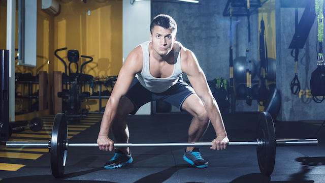 Man about to do a deadlift.