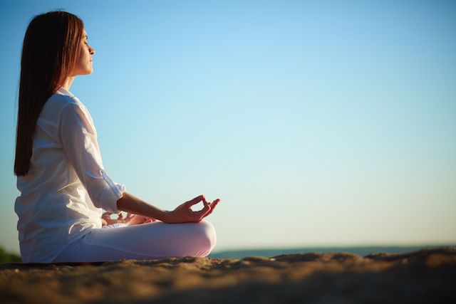 woman in mental meditation session with her eyes closed. 