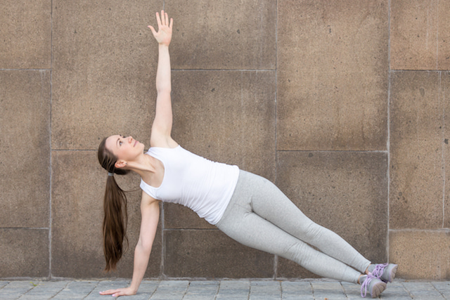 one performing a one-sided bodyweight plank. 