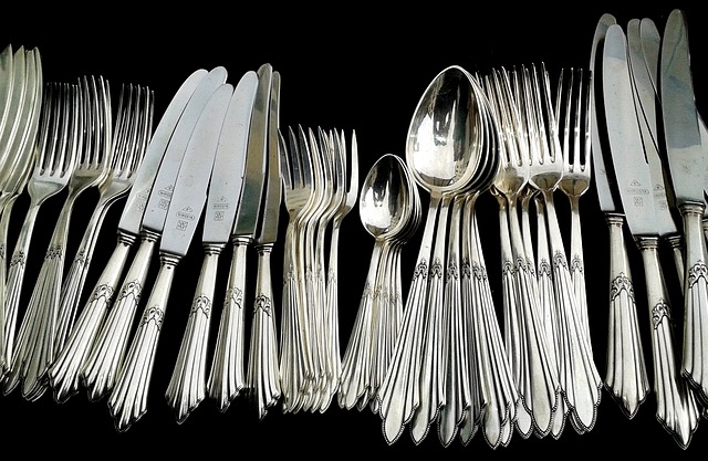 a table full of silverware, a common household item.